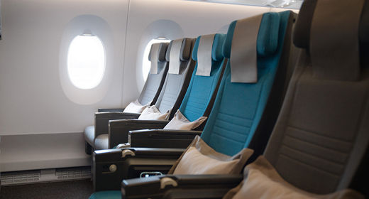 “Singapore Airlines cabin interior economy class.”

